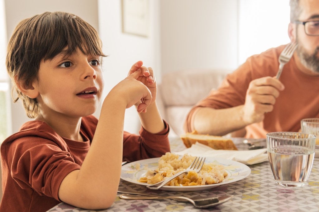Young boy eating